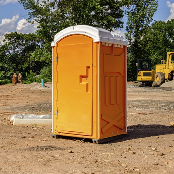 how often are the portable restrooms cleaned and serviced during a rental period in Corning